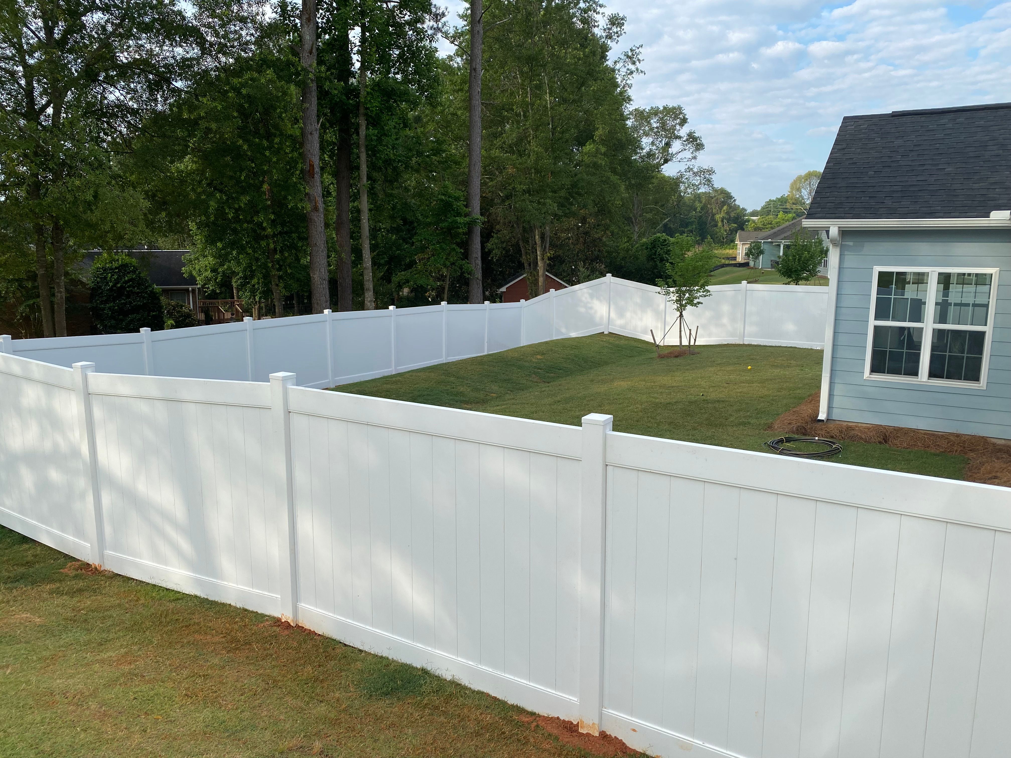 White vinyl fence